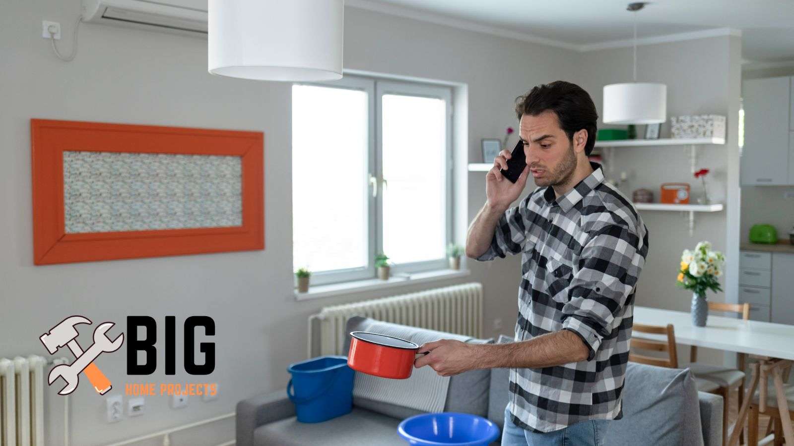 Man calling home insurance to see if they will cover leaky roofs - bighomeprojects.com