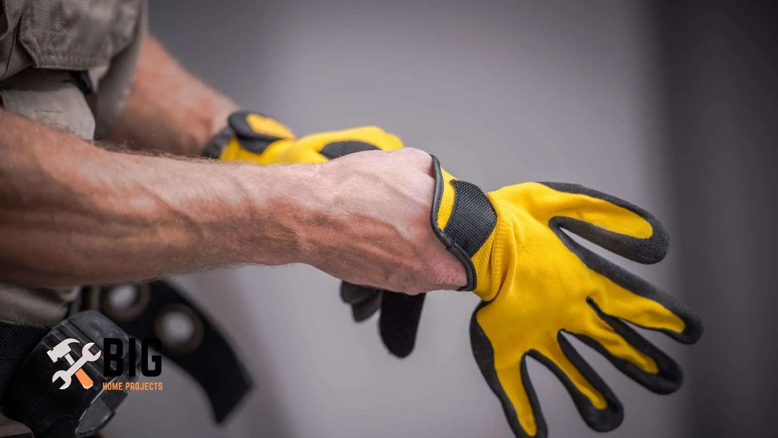 Plumber putting on gloves - bighomeprojects.com