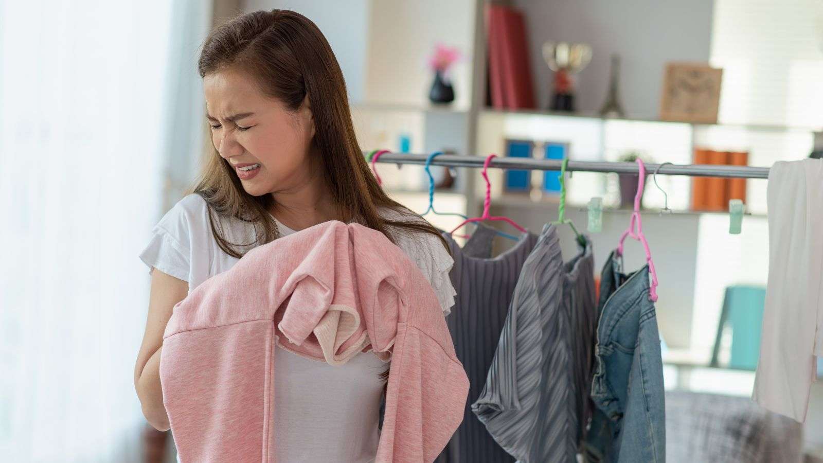 Girl smelling stinky sewer back up - bighomeprojects.com