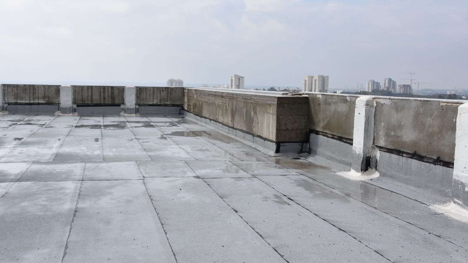 water pooling on commercial roof - bighomeprojects.com
