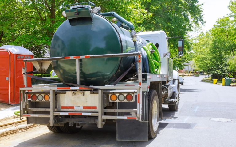 back of green septic truck 768x480