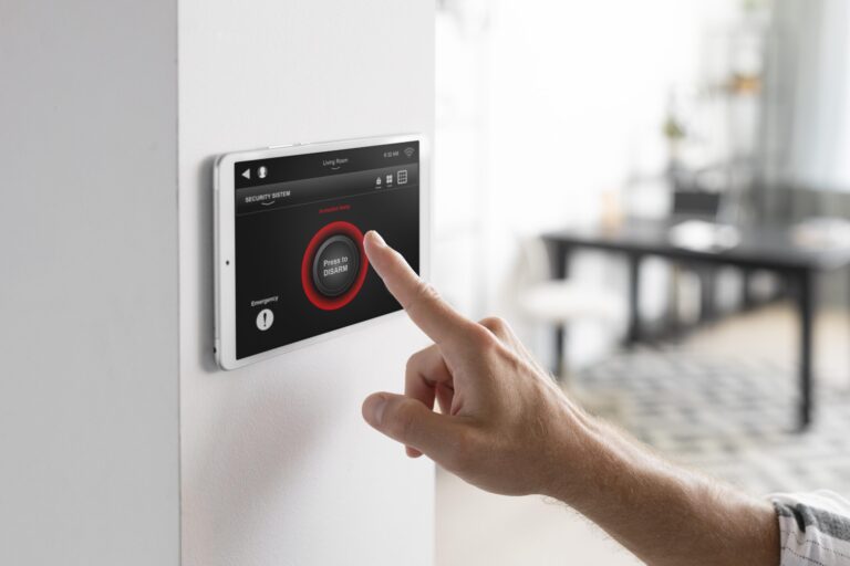 man using tablet his smart home scaled 1 768x512